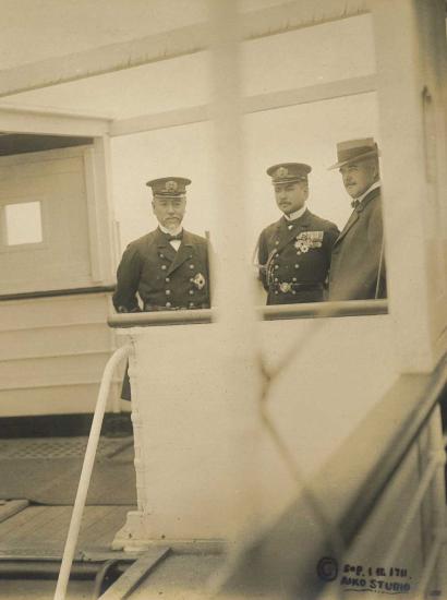 3 men standing on the deck of the Tanba Maru