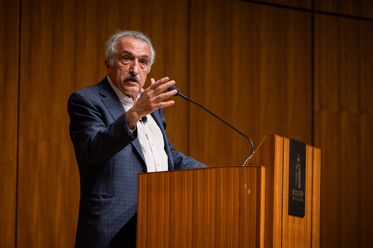 Research Fellow Abbas Milani speaks about Iran, the origin of the revolution and the ideological similarities between Iran’s theocratic rulers and Sayyid Qutb, known arguably as the godfather of modern Islamism, on August 13, 2024. (Patrick Beaudouin)