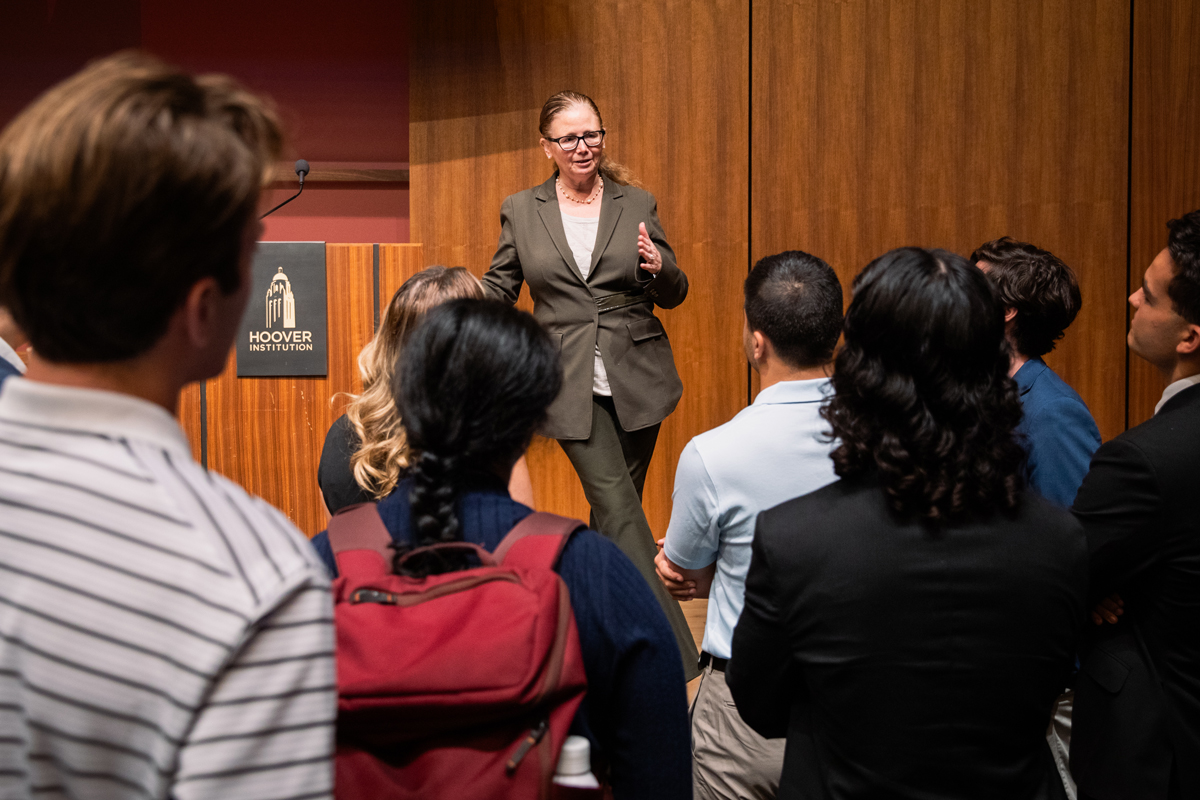 Senior Fellow Brandice Canes-Wrone speaks to HISPBC participants about campaign finance trends on August 14, 2024. (Patrick Beaudouin)