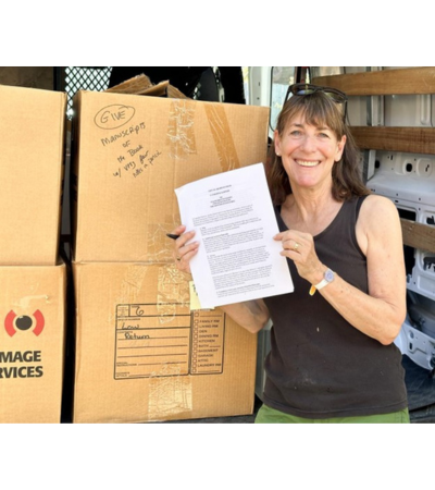 Catherine Karnow with the collection materials and deed of gift