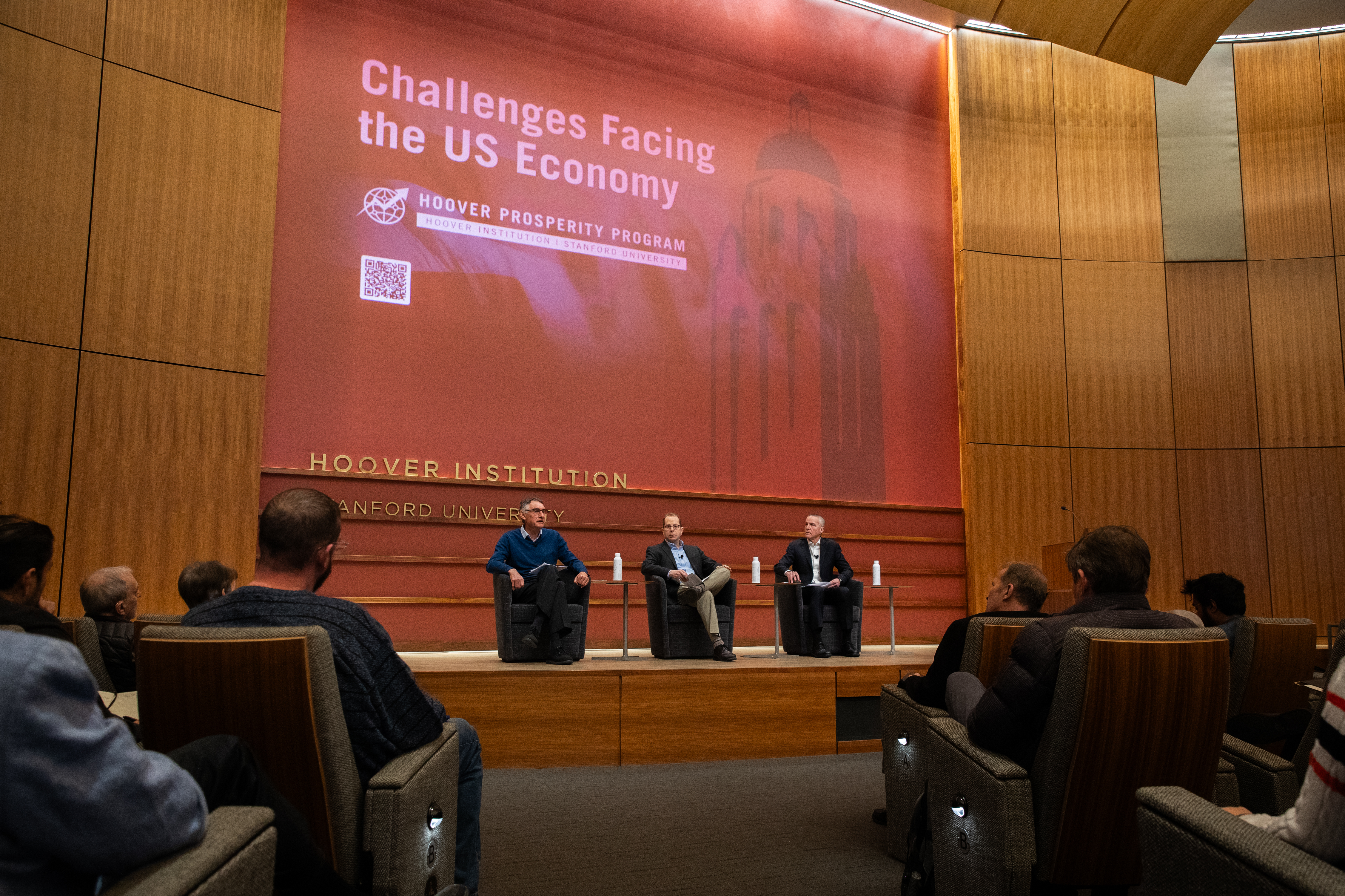 Emmanuel Saez (left), Bruce Meyer and Senior Fellow Ross Levine discuss income inequality at the Challenges Facing the US Economy Conference on January 21, 2025. (Patrick Beaudouin)