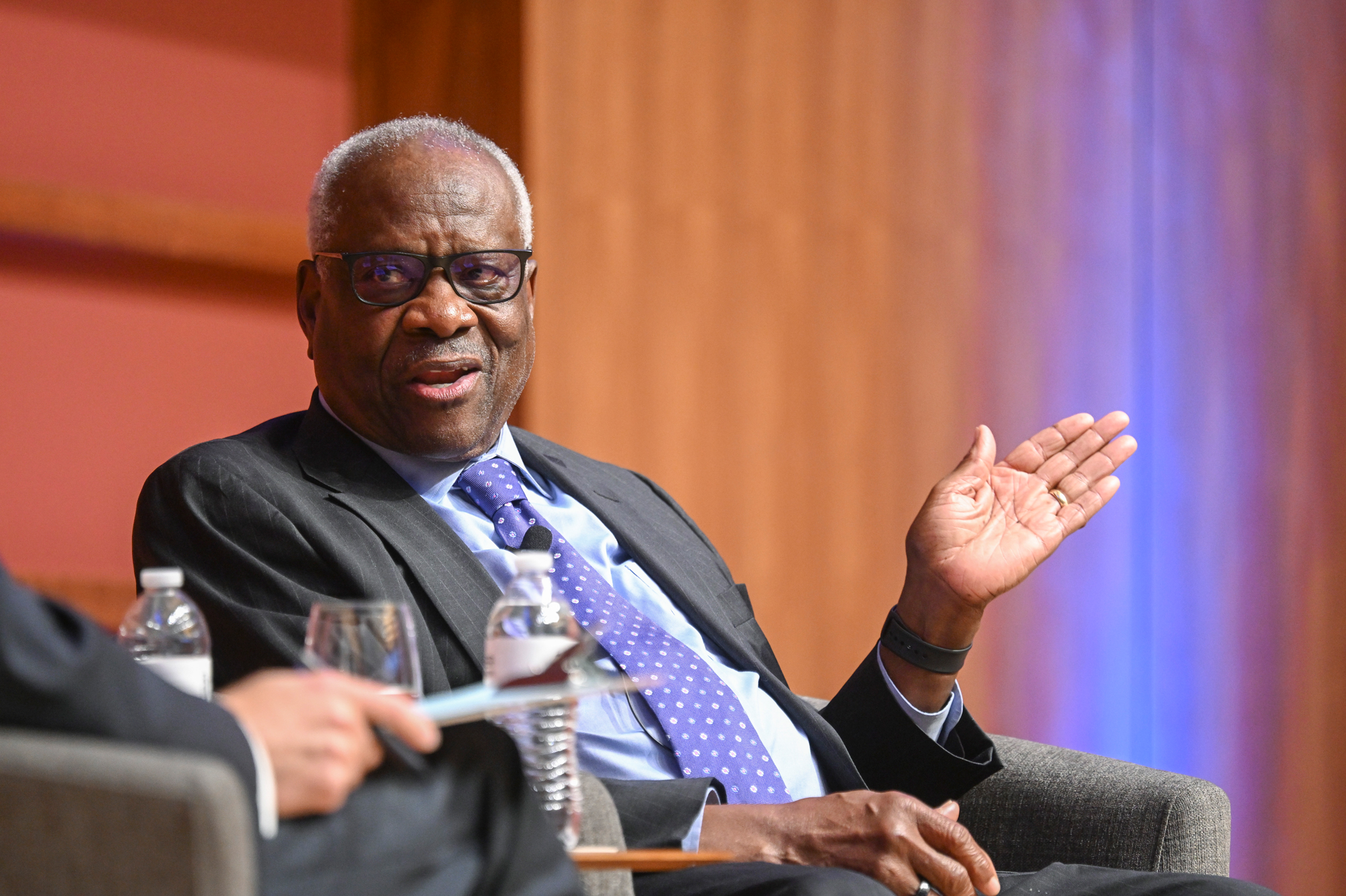 US Supreme Court Associate Justice Clarence Thomas speaks in Hauck Auditorium on October 20, 2025. (Patrick Beaudouin)