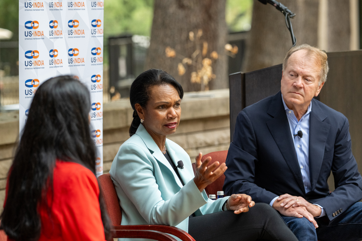 Hoover Institution Director Condoleezza Rice appears on a panel with NDTV’s Maha Siddique and former Cisco Chairman John Chambers at the INDUS-X Summit at Stanford on September 10, 2024. ((US-India Strategic Partnership Forum)