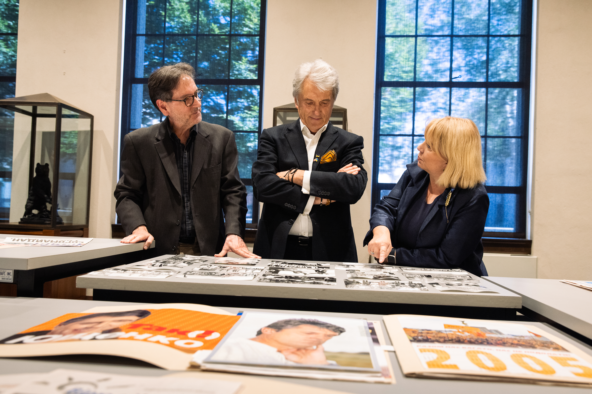 Former Ukrainian President Viktor Yushchenko is seen viewing his own presidential  campaign material from 2004 and 2005 at Hoover’s Library & Archives on October 2, 2024. (Patrick Beaudouin)