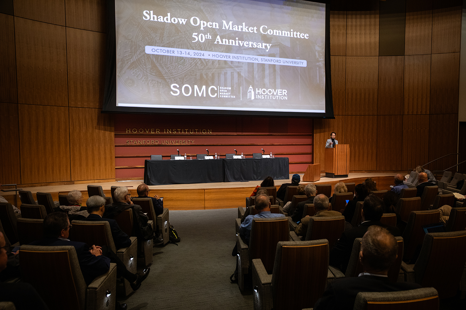 Attendees of the 50th anniversary meeting of the Shadow Open Market Committee 