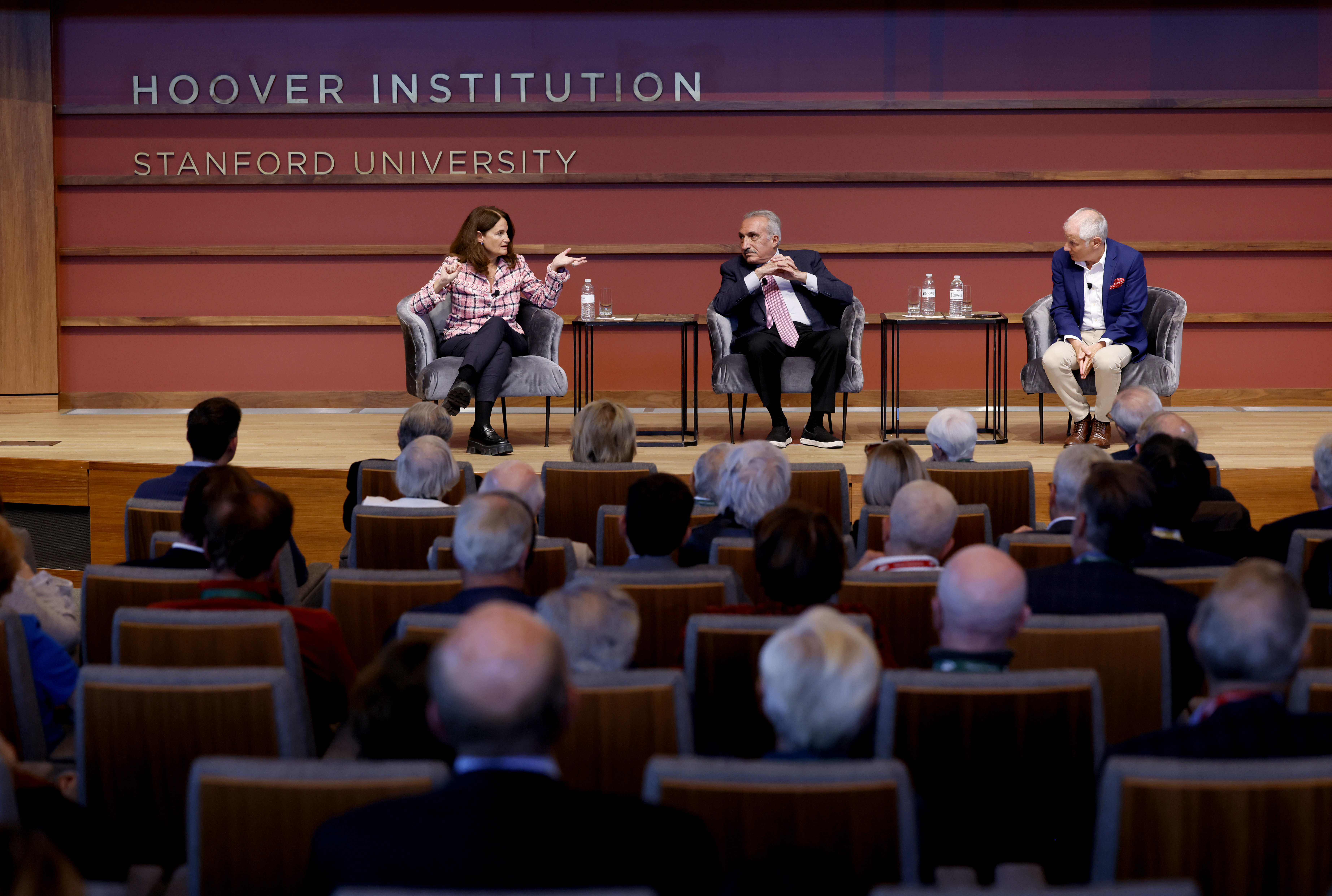 Hoover fellows Elizabeth Economy, Abbas Milani, and Stephen Kotkin discuss the history and current status of great-power competition on stage in Hauck Auditorium on October 17, 2024. (Eric Draper)