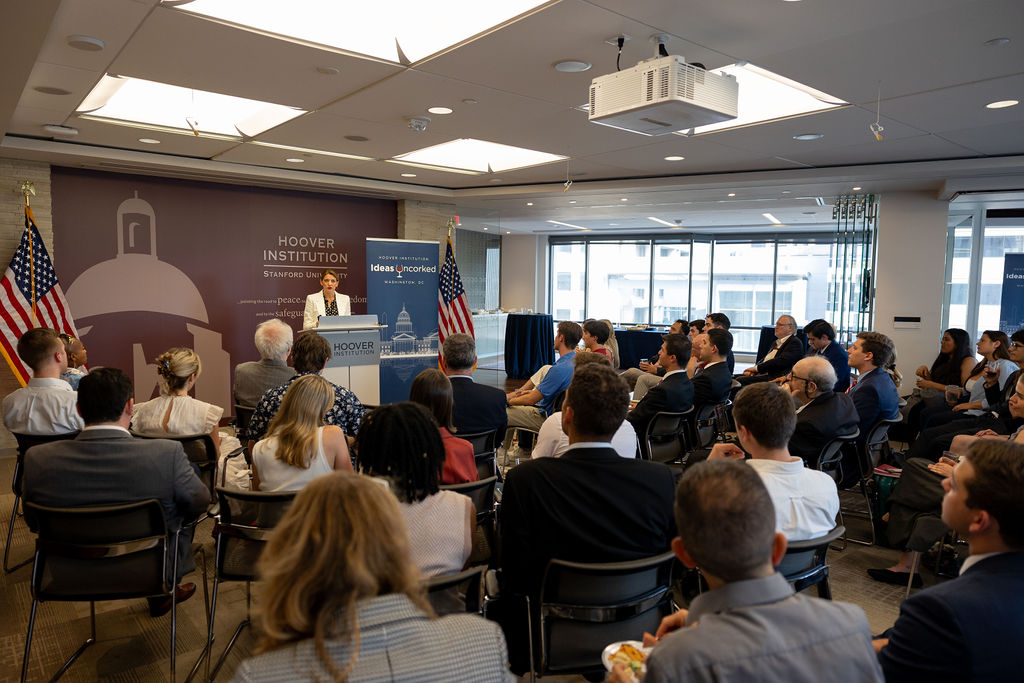 Jacquelyn Schneider speaks to the audience at the June 26 Ideas Uncorked event on AI and War. 