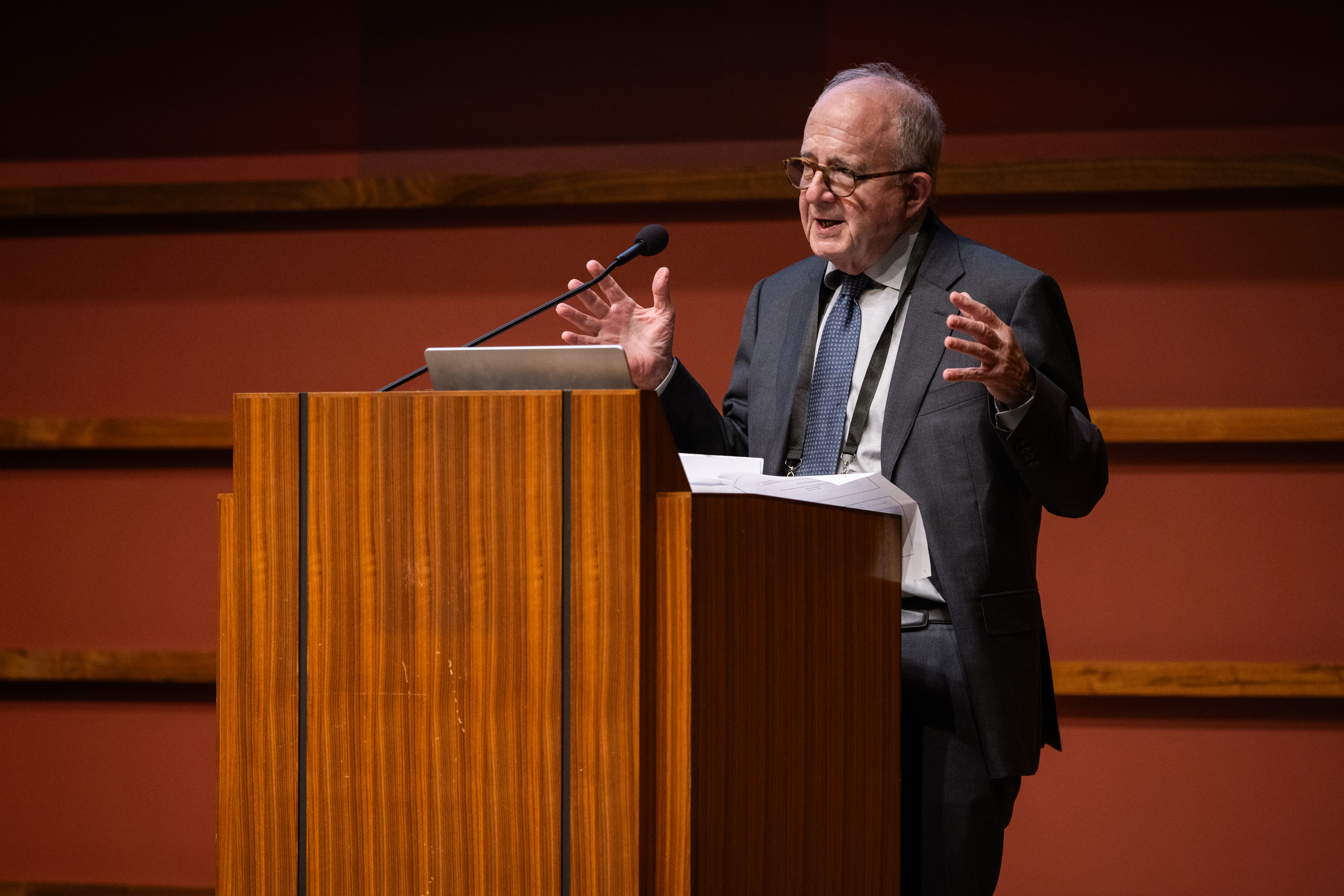 Distinguished Visiting Fellow Michael Bordo speaks in Hauck Auditorium during the fiftieth-anniversary meeting of the Shadow Open Market Committee on October 14, 2024. (Patrick Beaudouin)