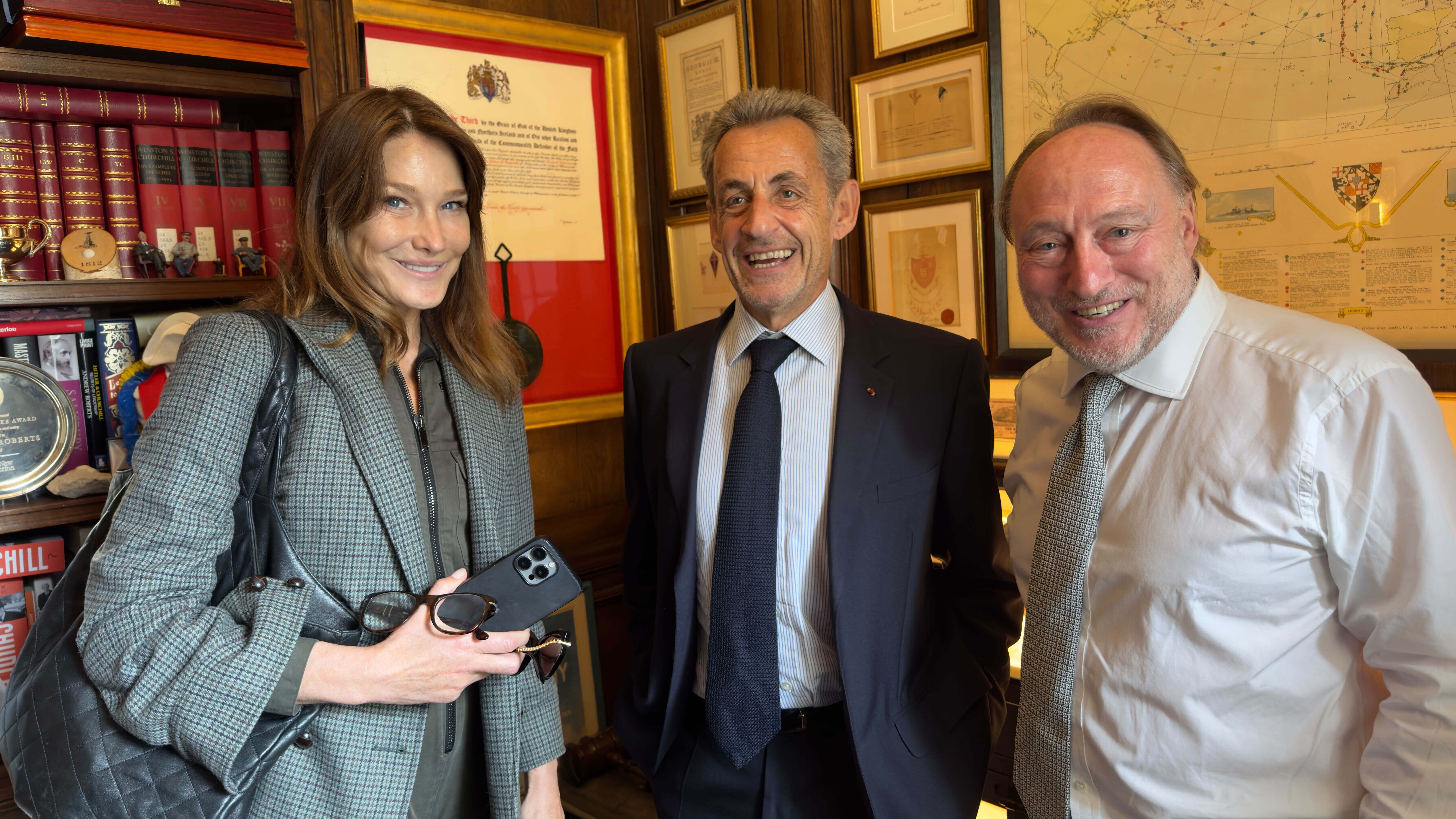 Carla Bruni, former French president Nicolas Sarkozy, and Andrew Roberts are seen in London on June 4, 2024. During their meeting, Roberts interviewed Sarkozy for Secrets of Statecraft. 