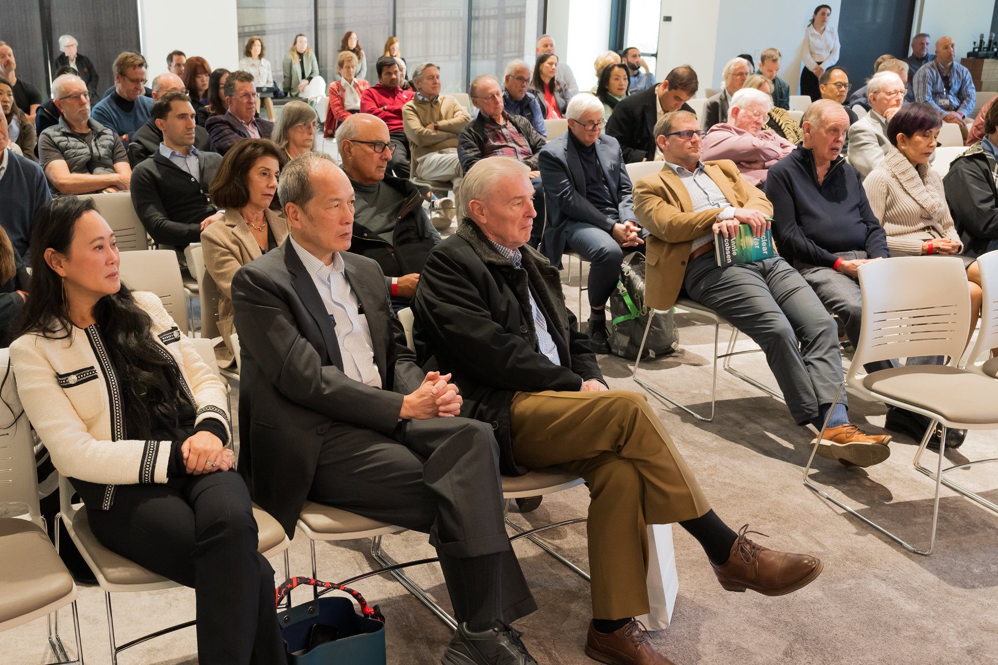 An audience listens to SF Fed President and CEO Mary C. Daly speak about the labor market, inflation and AI in Shultz Auditorium on December 6, 2024. (Steve Castillo)