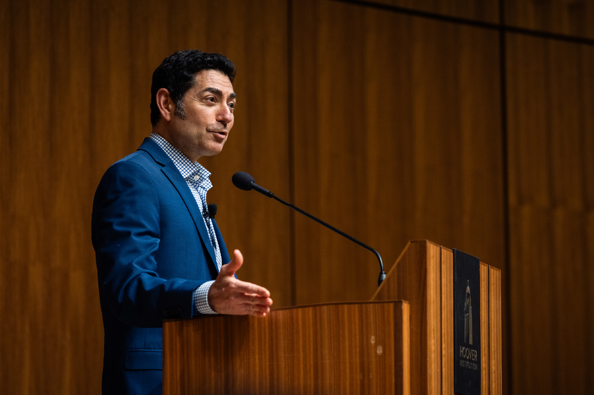 Mariano-Florentino (Tino) Cuéllar, president of the Carnegie Endowment for International Peace, speaks in Hauck Auditorium about his time in education reform during the Barack Obama presidency. (Patrick Beaudouin)