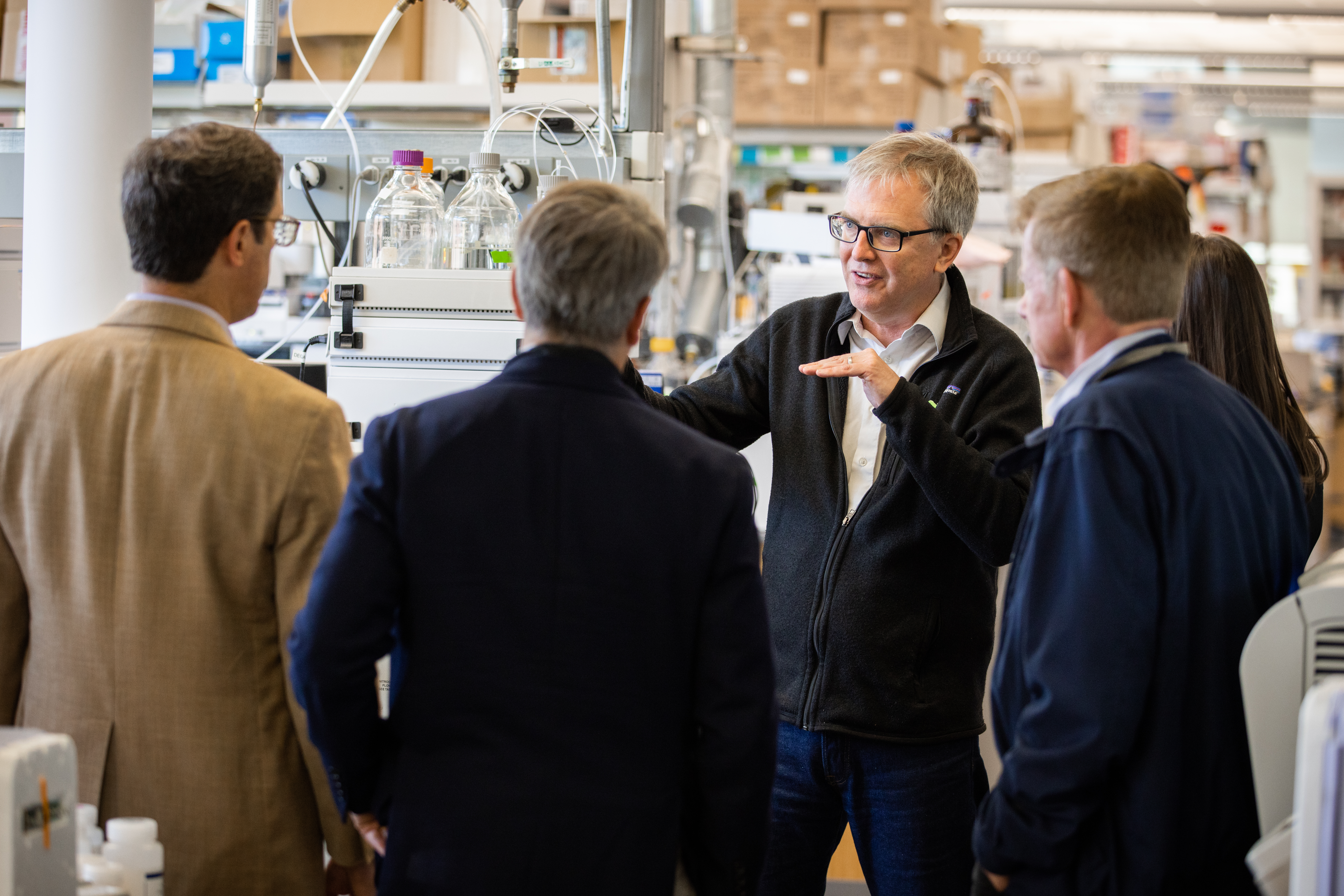 Science Fellow Drew Endy gives State and Local Leadership Forum participants a tour of a Stanford Lab on May 21. (Patrick Beaudouin)