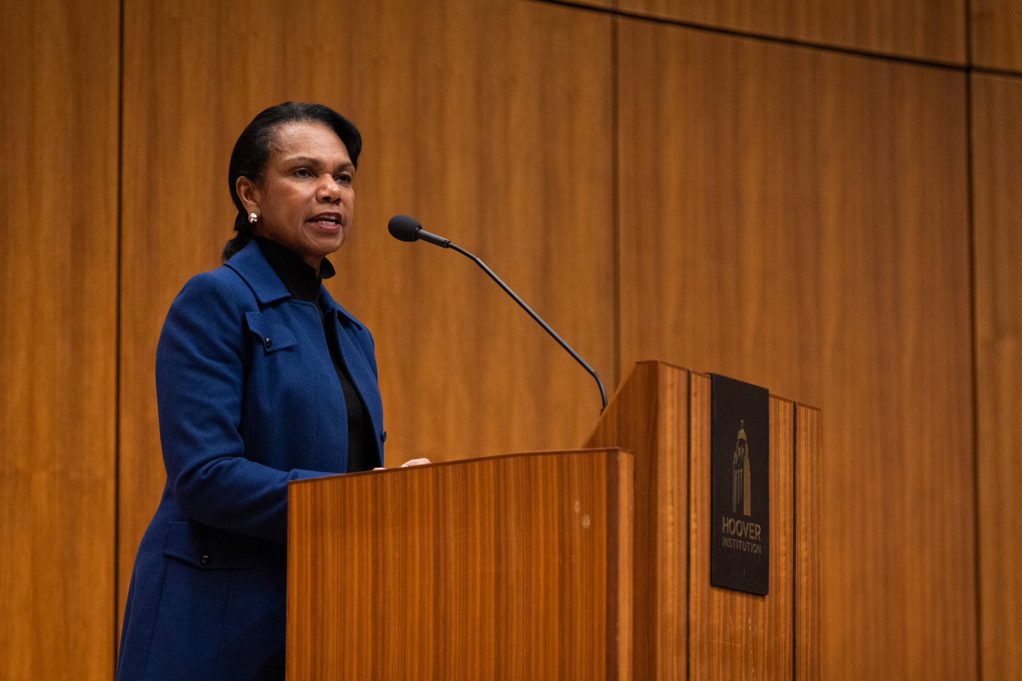 Hoover Institution Director Condoleezza Rice welcomes attendees of the Challenges Facing the US Economy Conference on January 21, 2025. (Patrick Beaudouin)