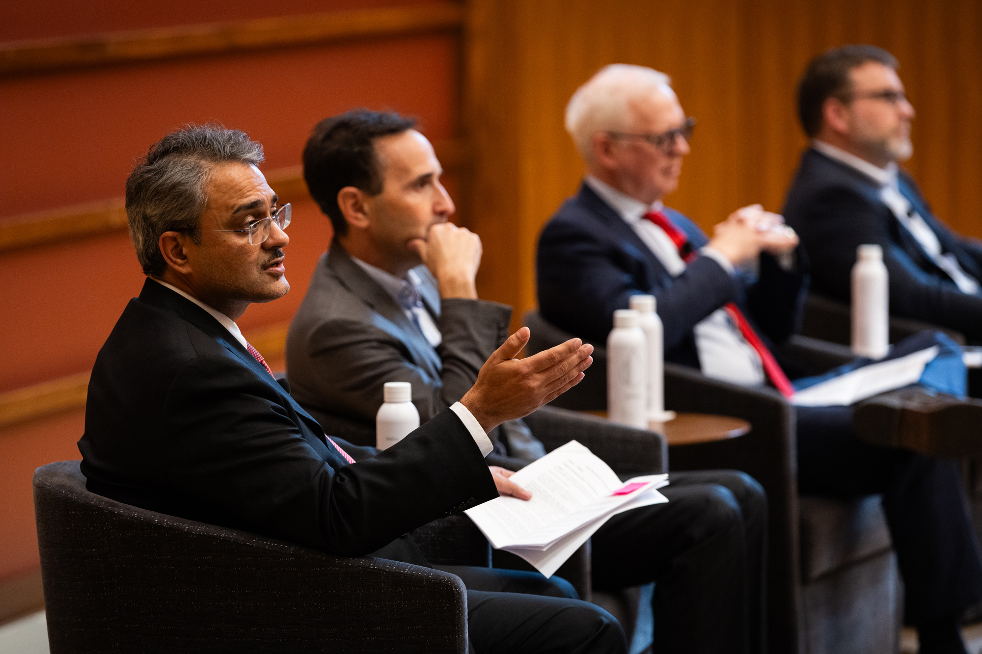 Senior Fellow Amit Seru speaks on a panel about AI alongside Hoover fellows Steven J. Davis, Justin Grimmer, and Stanford University President Jonathan Levin on January 21, 2025. (Patrick Beaudouin)