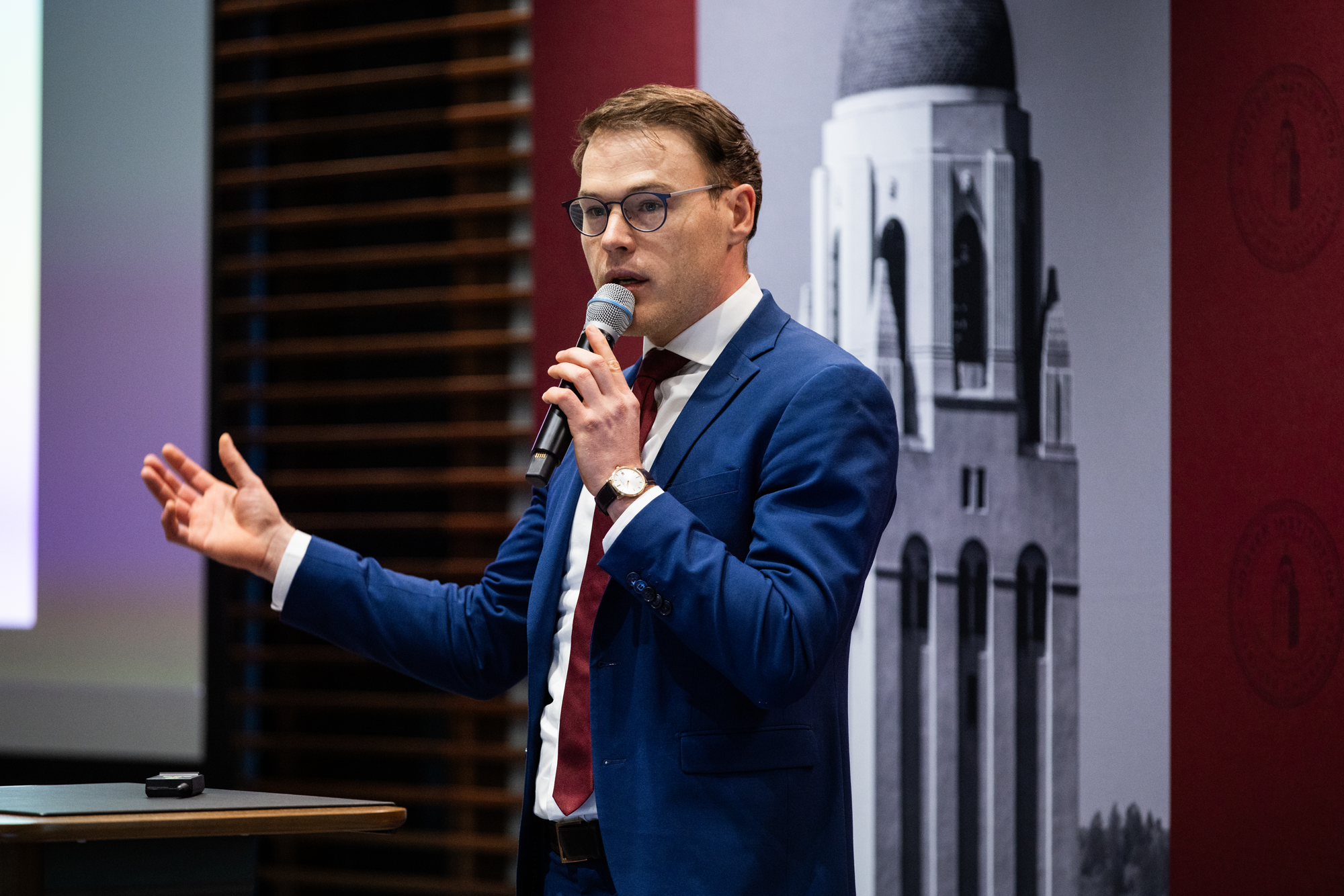 Hoover Research Fellow Oliver Giesecke speaks to attendees of the Conference on Collaborative State and Local Policy Research in Shultz Auditorium on January 28, 2025. (Patrick Beaudouin)