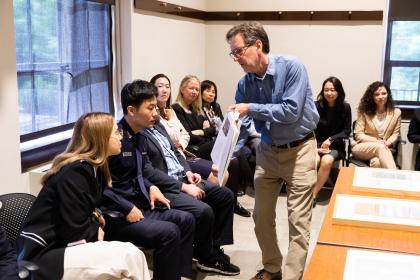 Research Fellow Bertrand Patenaude shows archival materials during an international conference