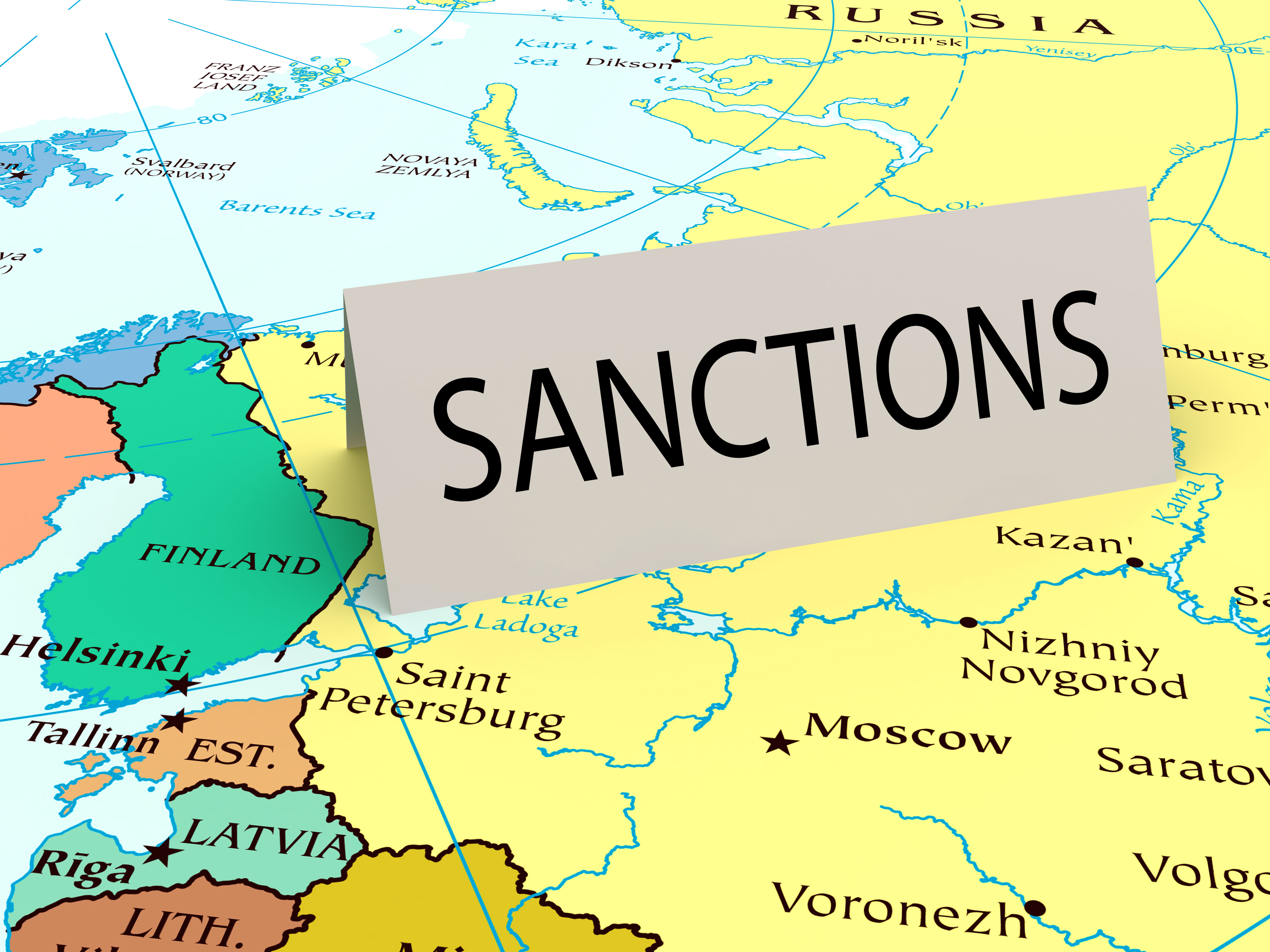 Card that says "sanctions" on a map of Russia