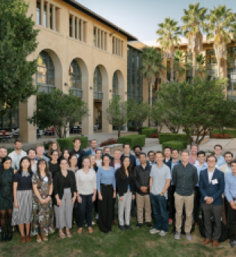 Participants in the 2024 Implications of Remote Work Conference pose in front of Stanford’s Institute for Economic Policy Research (SIEPR) on October 9, 2024. (Ryan Zhang)