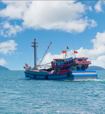 Vietnamese fisherman boat stock photo