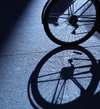 NYC cycling in blue night shadows stock photo