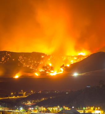 Night long exposure photograph of wildfire stock photo