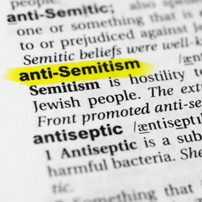 Highlighted English word "anti semitism" and its definition in the dictionary - stock photo