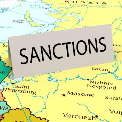 Card that says "sanctions" on a map of Russia