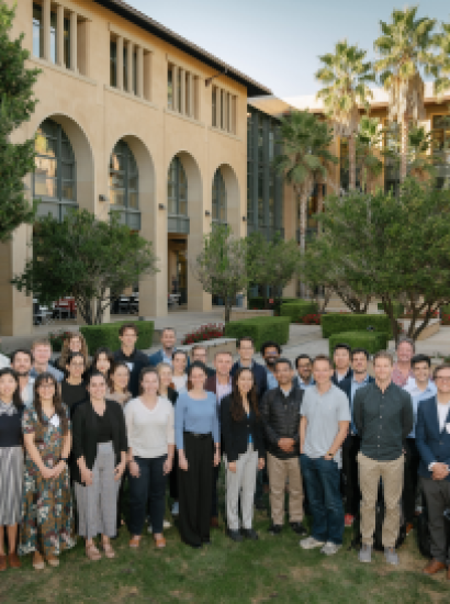 Participants in the 2024 Implications of Remote Work Conference pose in front of Stanford’s Institute for Economic Policy Research (SIEPR) on October 9, 2024. (Ryan Zhang)