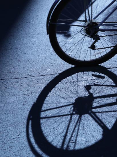 NYC cycling in blue night shadows stock photo