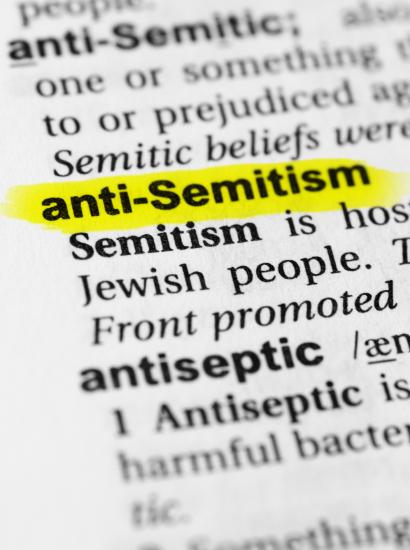 Highlighted English word "anti semitism" and its definition in the dictionary - stock photo