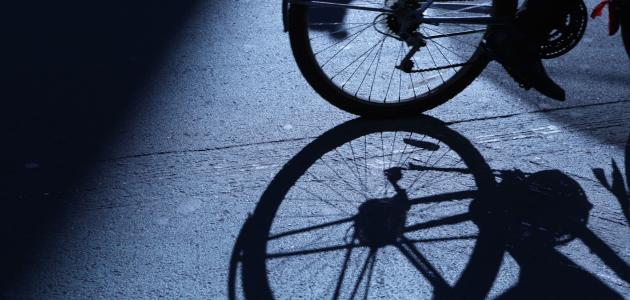 NYC cycling in blue night shadows stock photo