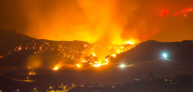 Night long exposure photograph of wildfire stock photo