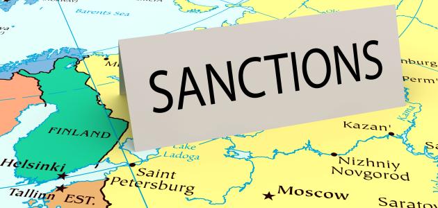 Card that says "sanctions" on a map of Russia