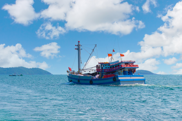 Vietnamese fisherman boat stock photo