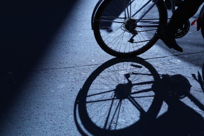 NYC cycling in blue night shadows stock photo