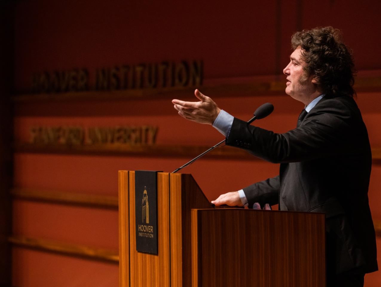Argentine President Javier Milei gestures at the podium as he speaks in Hauck Auditorium on May 29, 2024.
