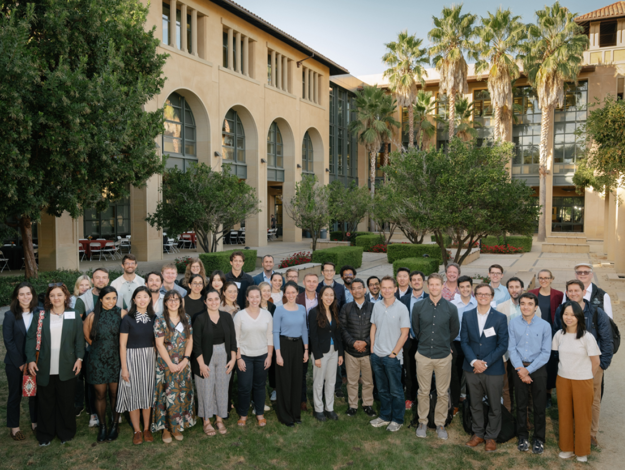 Participants in the 2024 Implications of Remote Work Conference pose in front of Stanford’s Institute for Economic Policy Research (SIEPR) on October 9, 2024. (Ryan Zhang)