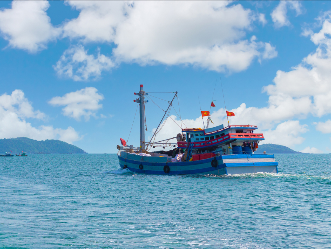 Vietnamese fisherman boat stock photo