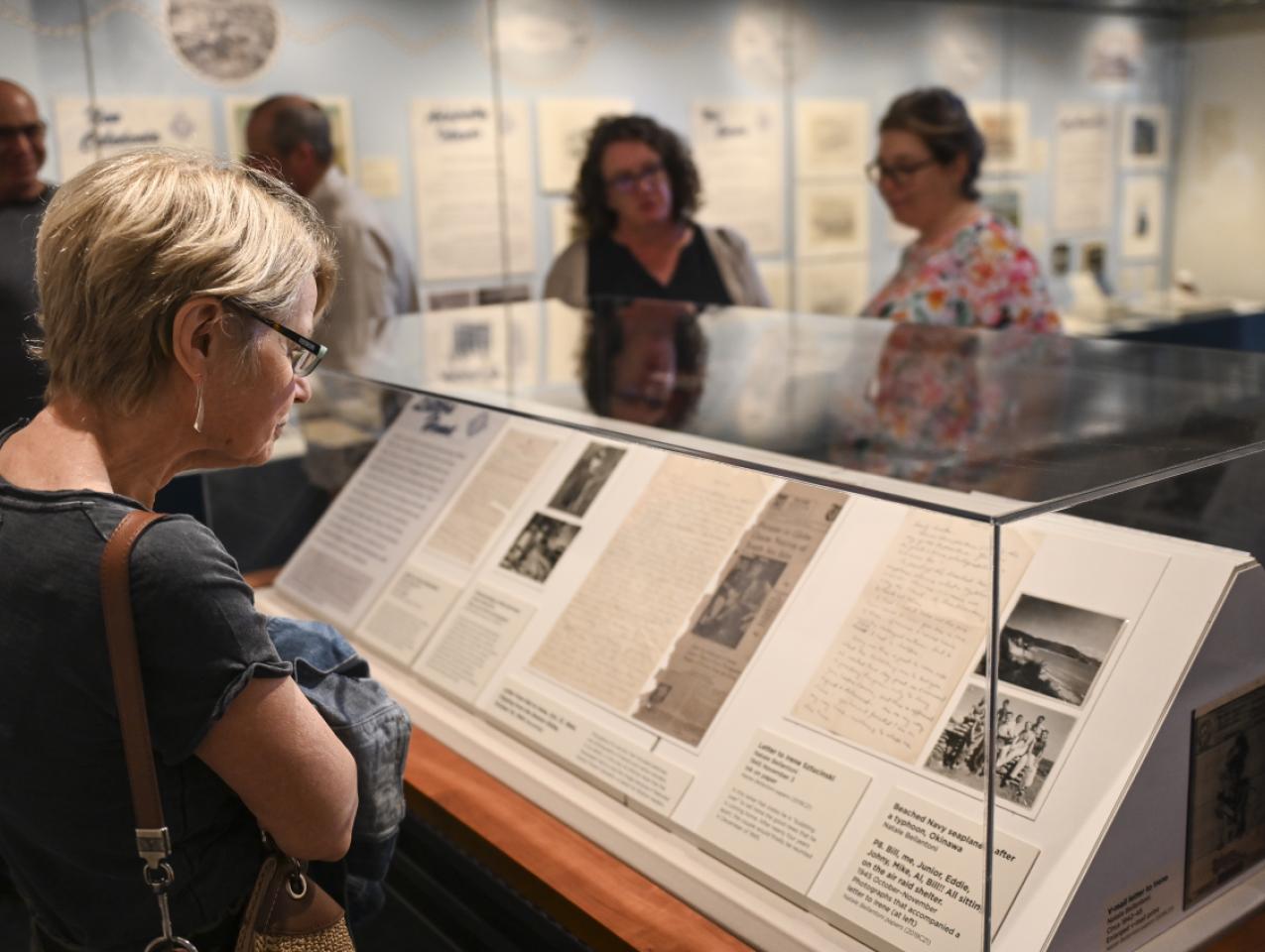 Visitor viewing The Battalion Artist exhibition 