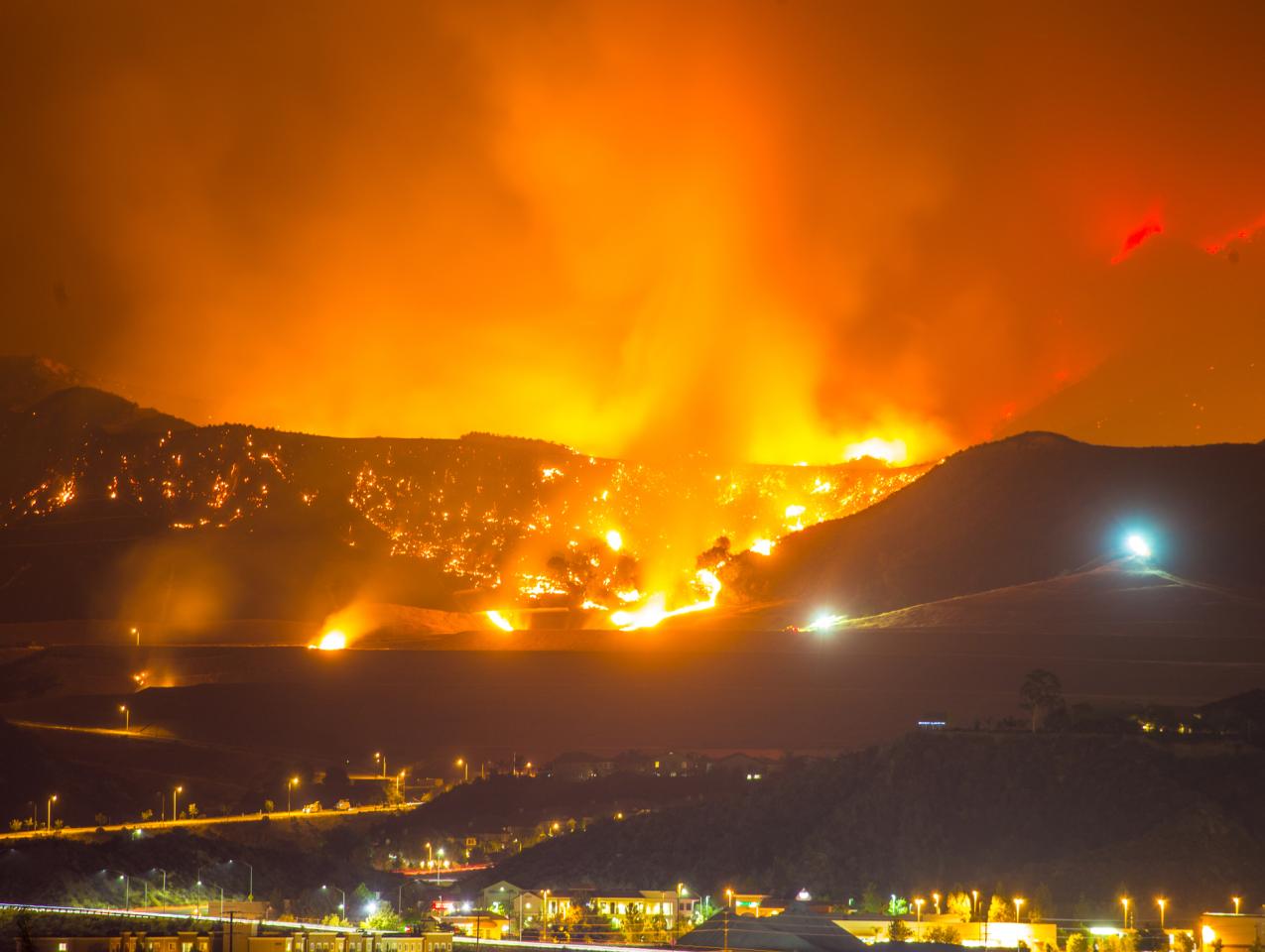 Night long exposure photograph of wildfire stock photo