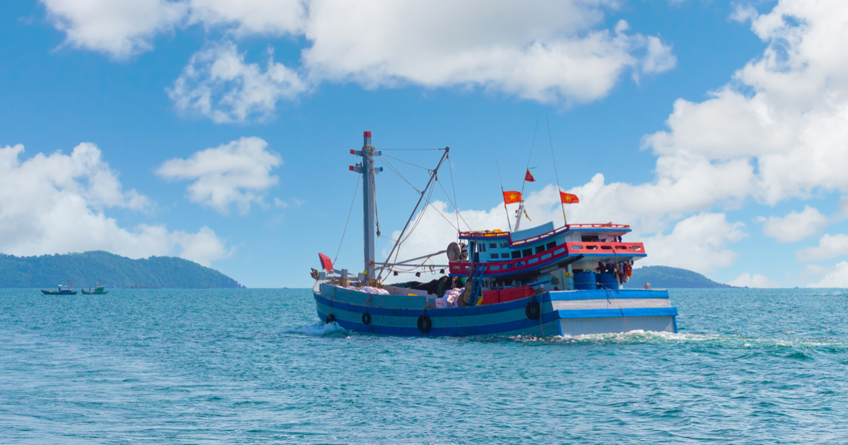 Vietnamese fisherman boat stock photo