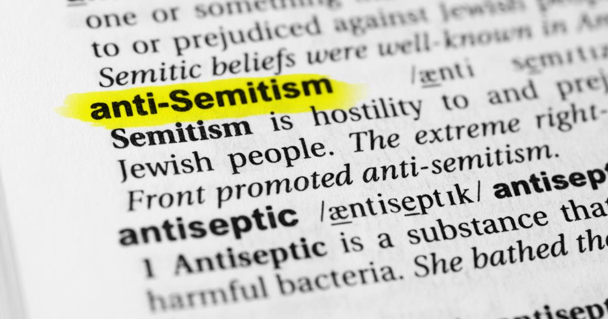 Highlighted English word "anti semitism" and its definition in the dictionary - stock photo