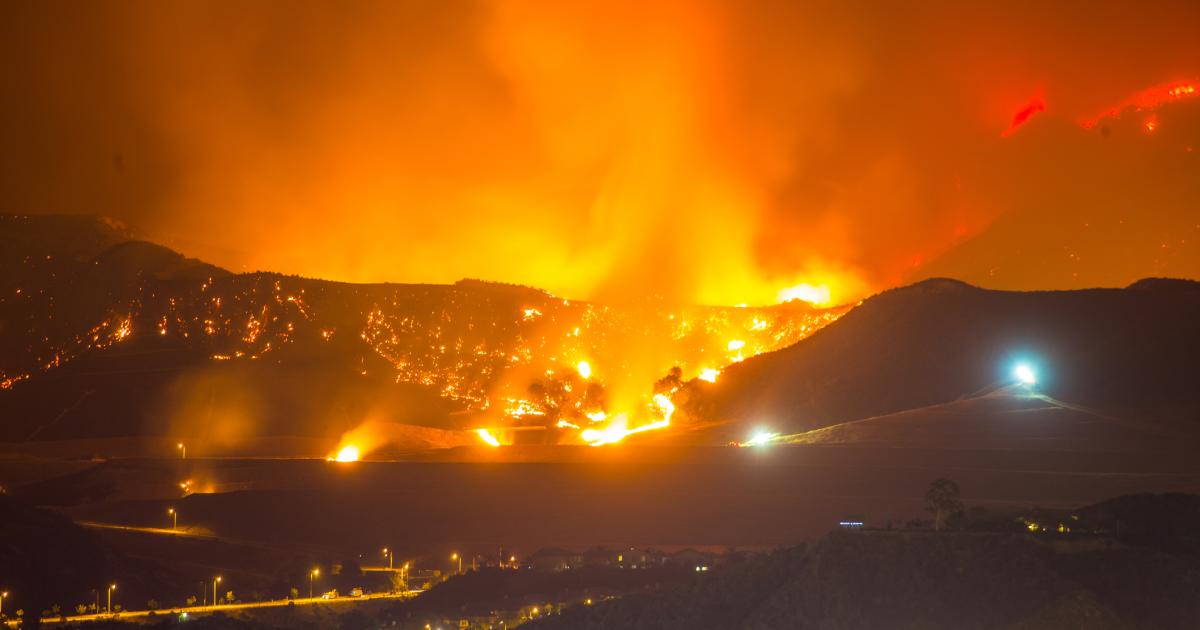 Night long exposure photograph of wildfire stock photo