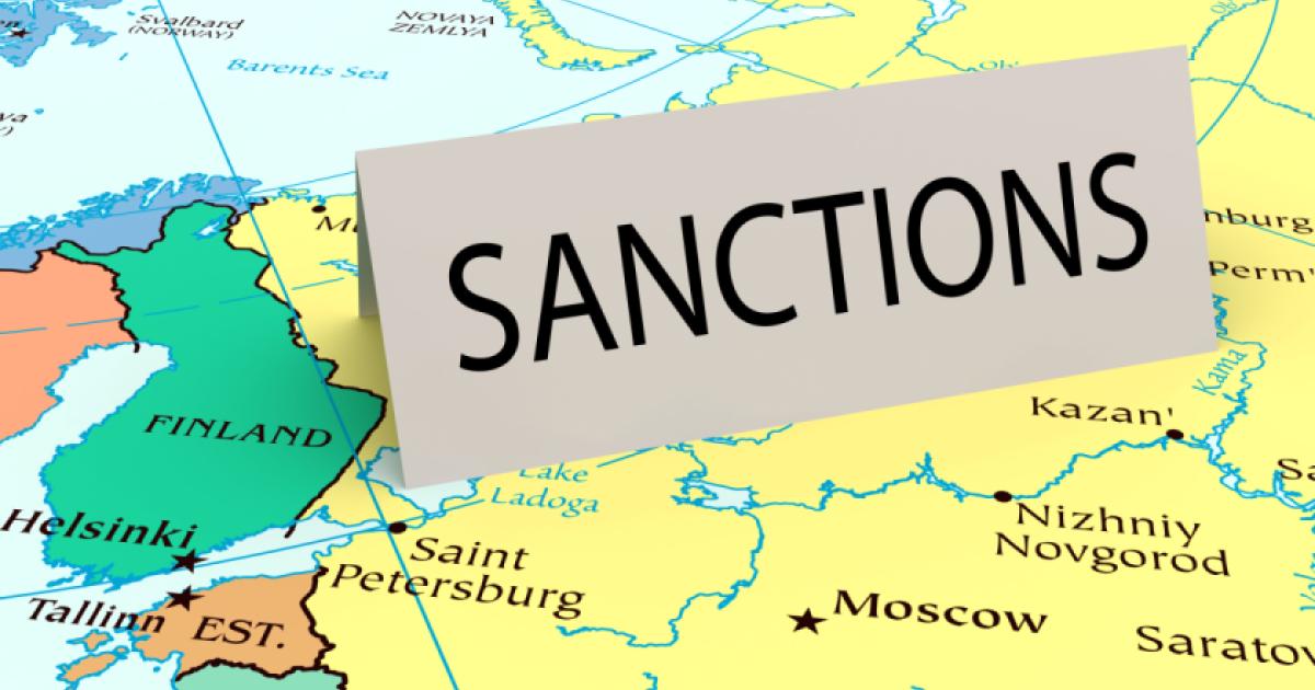 Card that says "sanctions" on a map of Russia