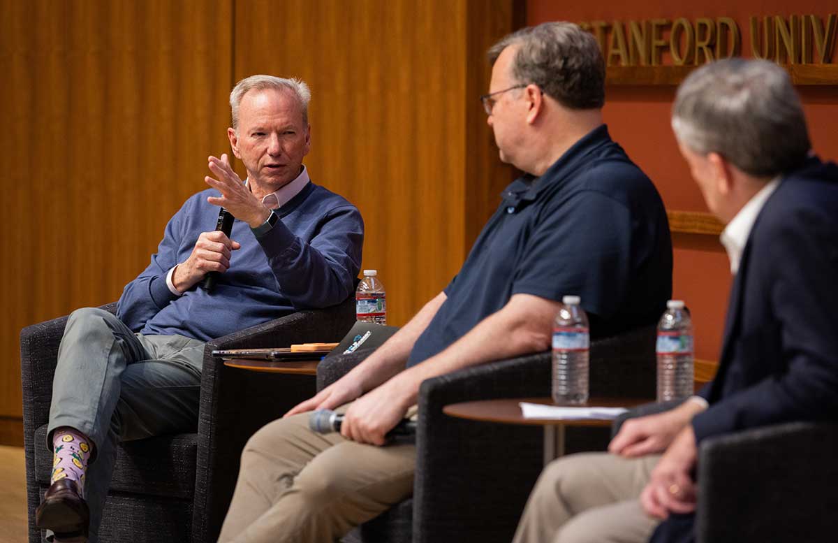 Former Google CEO and chair Eric Schmidt (left) and LinkedIn cofounder Reid Hoffman (center) speak about the future of AI development on April 15, 2024.