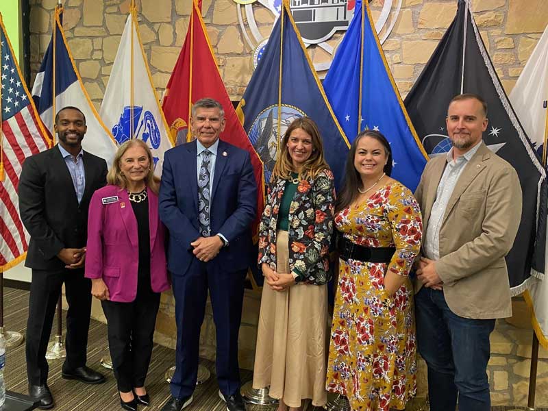 Veteran Fellows Adrian Perkins (far left) and Trillitye Paullin (second from right) with Hoover Fellow Jacquelyn Schneider (center right) at a post-9/11 veteran town hall event in San Antonio, Texas. At far right is Donnie Hasseltine, alumnus of the program (2021–22).